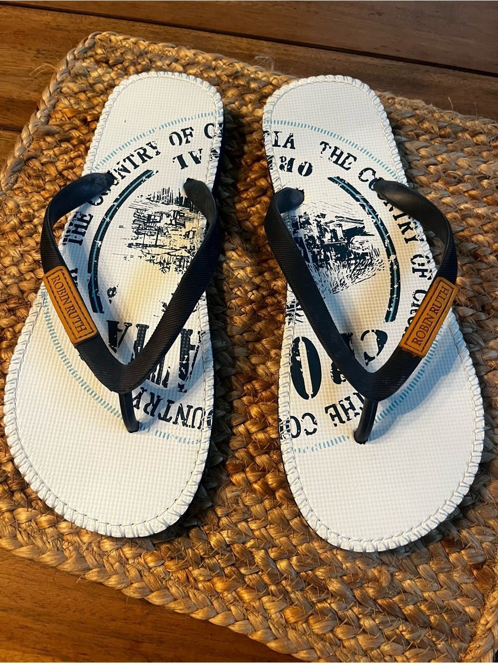 Robin Ruth White Graphic Flip Flops with Black Straps;size 11 NWOT